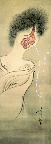 顔の中心に大きく裂けた口から、さらに小さな顔が覗く、異形の女性を描いた浮世絵様式の肉筆画。