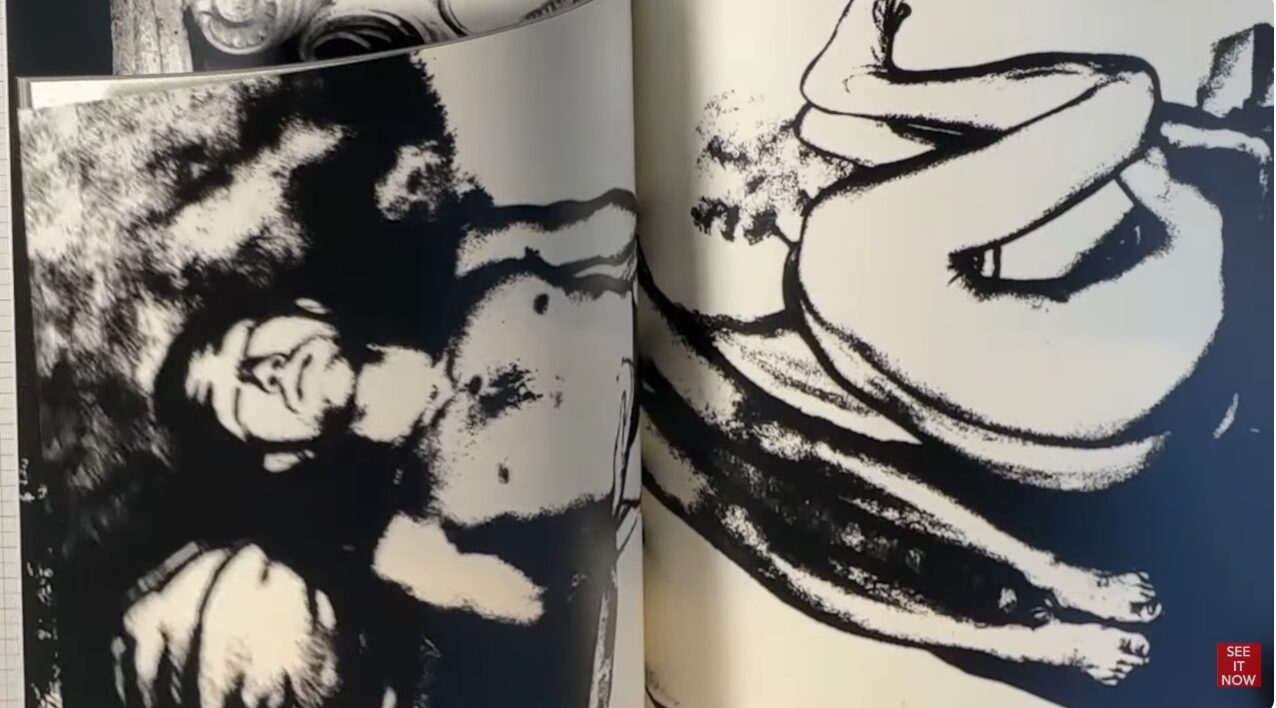 コントラストの強い白黒のイラストが描かれたページを開いている様子。三島由紀夫の顔や身体の輪郭が荒いタッチで表現されている。